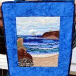 Photo of Quilt: SusanB_leaninggleaminglight