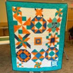 Photo of Quilt: Bitty-Barn-Buzz_Lavonna-Rasberry