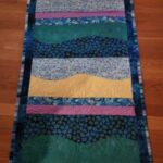 Photo of Quilt: Trish-Payne_Bythesearunnerfront